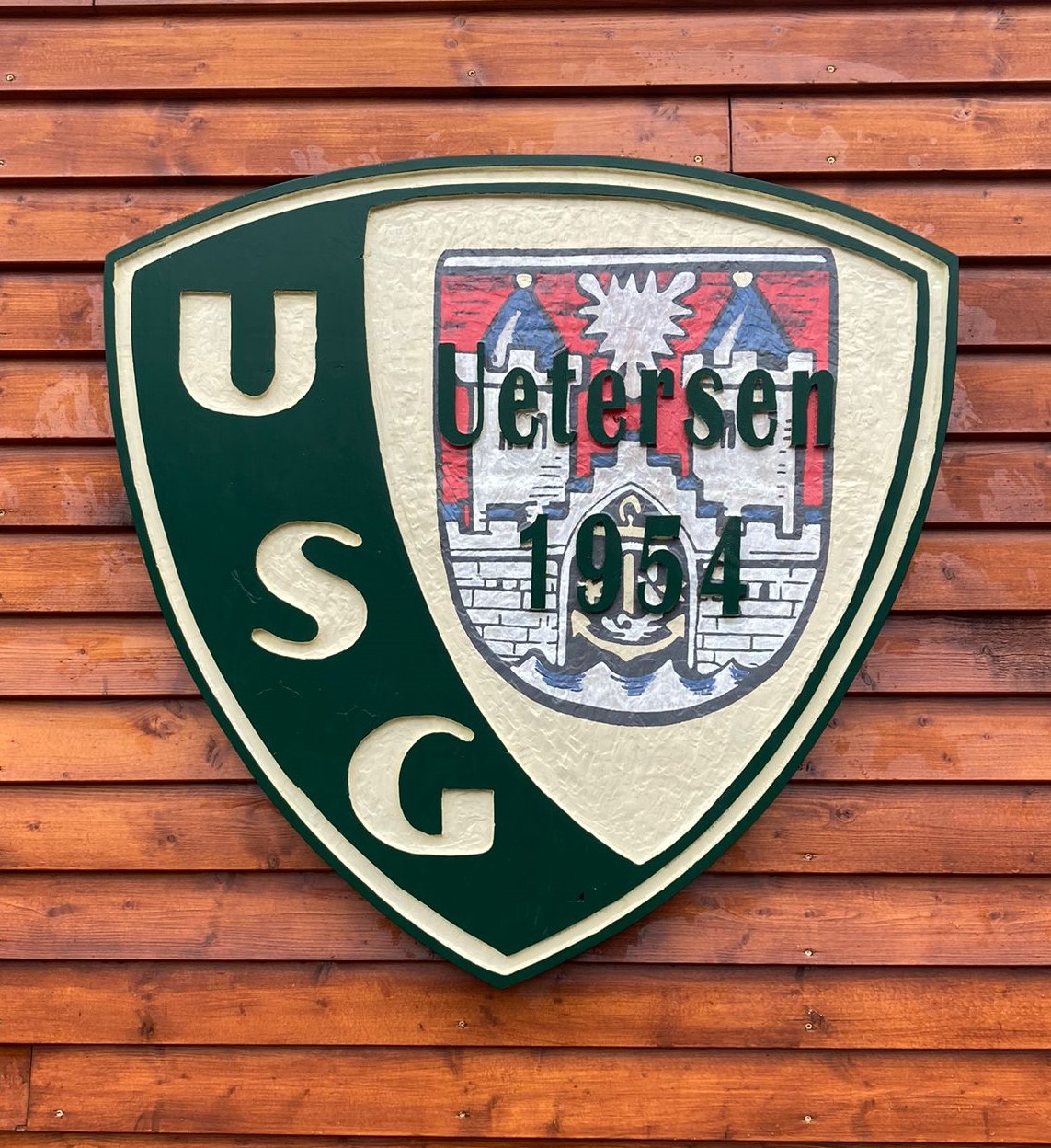 USG-Wappenan der Vereinshüte 2023